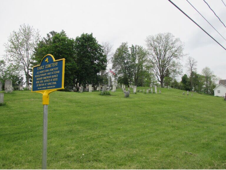 New York State historical marker for early cemetery.