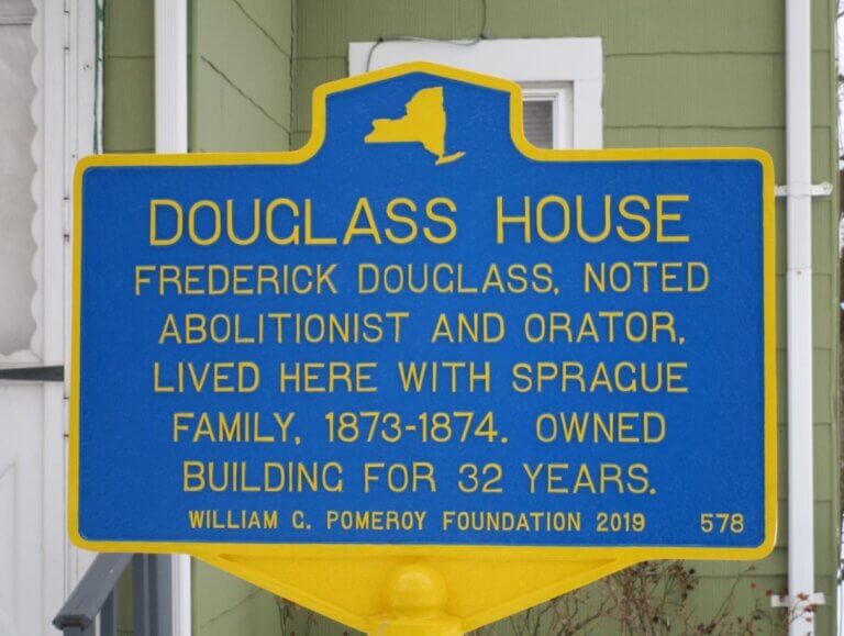 New York State historical marker for the Frederick Douglass house, Rochester, New York. Marker funded by the William G. Pomeroy Foundation.