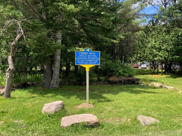 New York State historical marker for former hotel, Raquette Lake, New York.