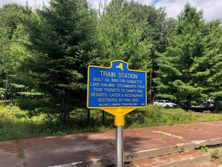 New York State historical marker for train station.