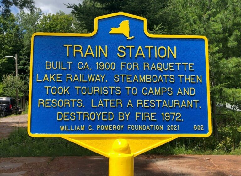New York State historical marker for train station.