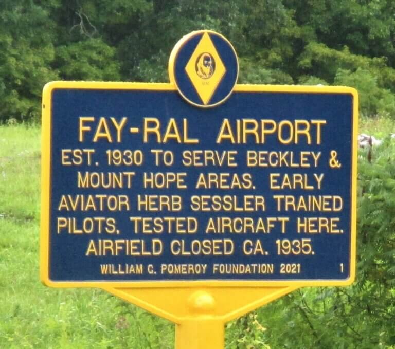 Historical marker for Fay-Ral Airport.